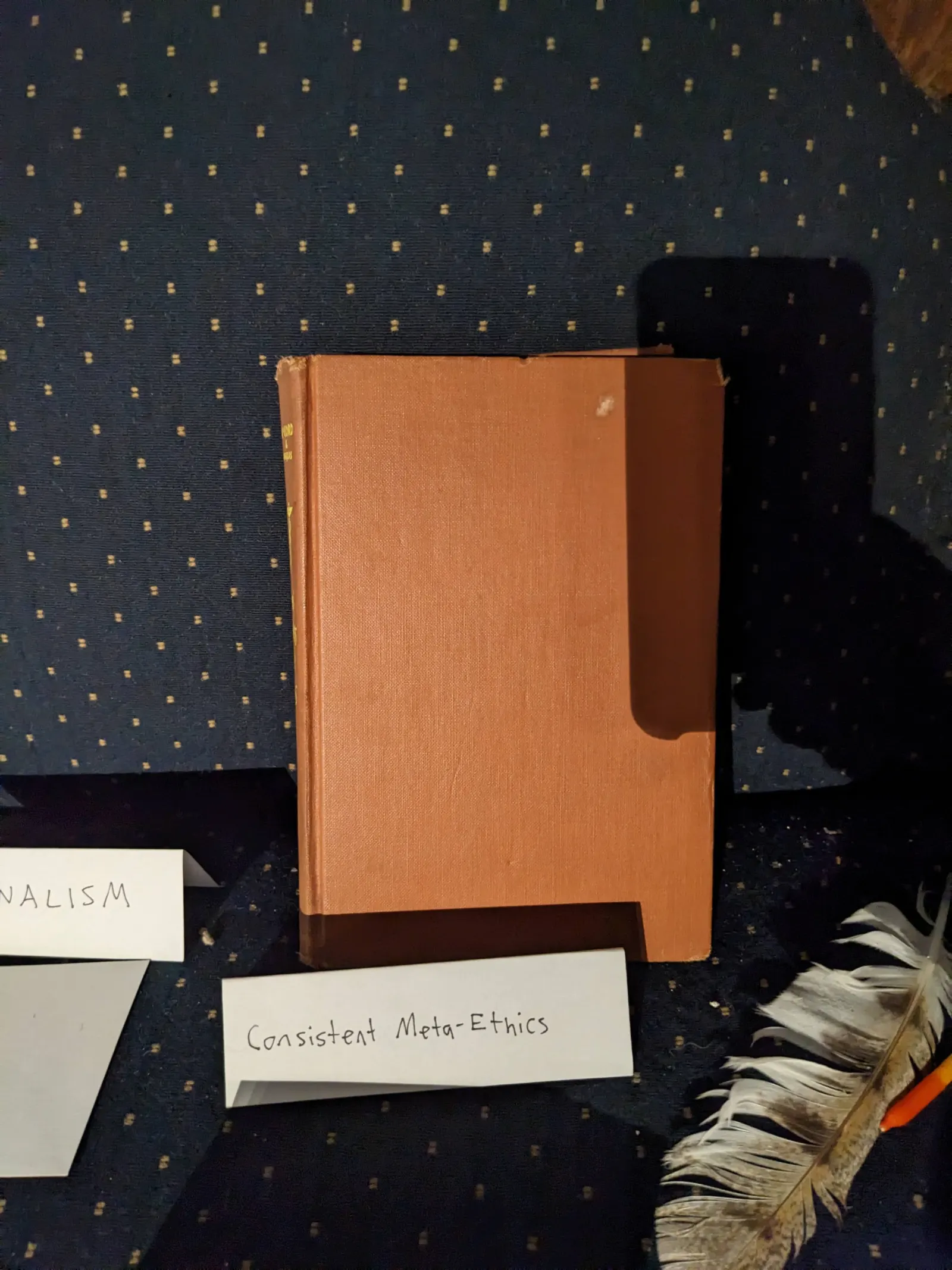 An orange object and its labeled tent sign on the Ideology Altar.